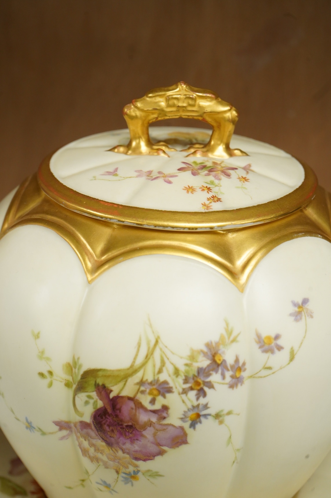 A Worcester floral biscuit barrel on stand, numbered 1412 to the base, 18cm high